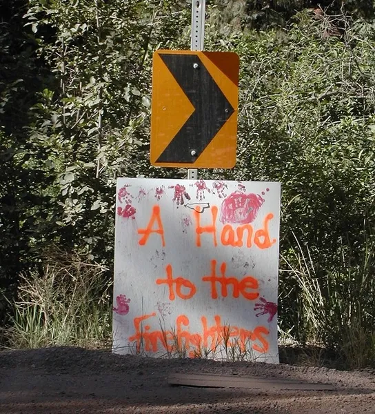 Local praise - Circa 2002: The locals praised the support and efforts of the firefighting crews in saving their forest and houses.